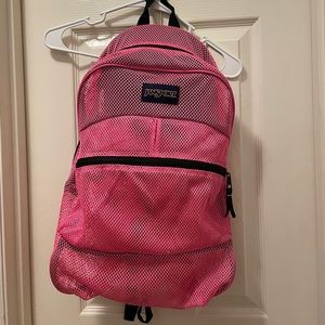 Pink mesh Jansport backpack. Very good condition.